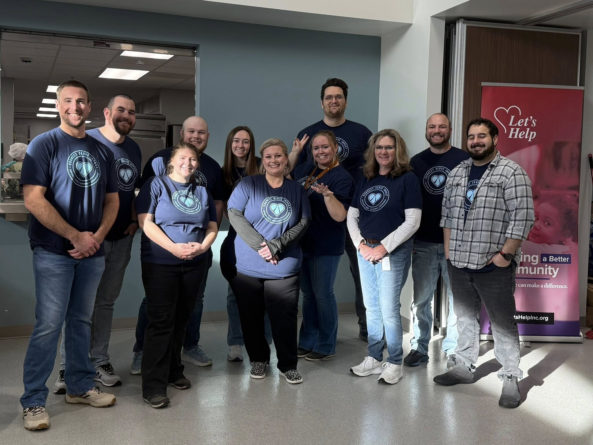 Christmas Bureau 2025 Lets Help Advisors Excel volunteers.jpg